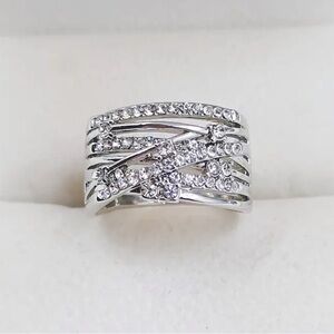 Intricate Stainless Steel Ring with Multi-Band Design and Diamonds
